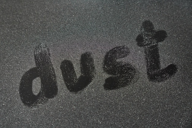 Dust on dusty black surface