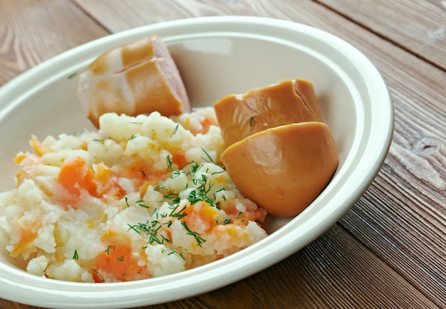 Dutch Hutspot -  dish of boiled and mashed potatoes, carrots and onions.  traditional Dutch cuisine.
