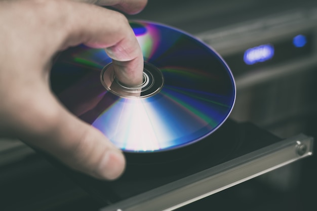 DVD disc inserting to video player