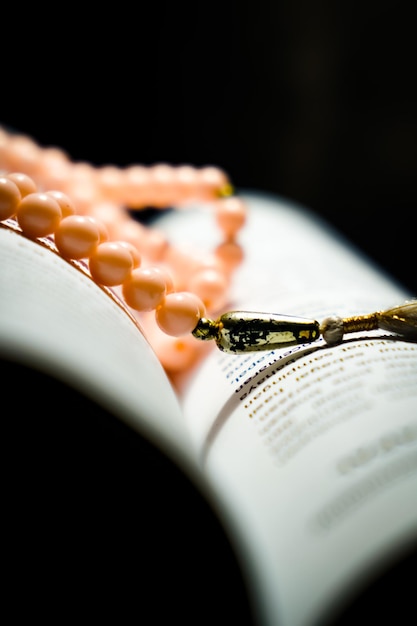 Dzikir praying by counting the prayer beads