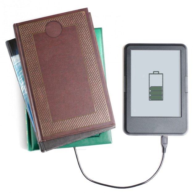 E-book reader and book connected with cable. White background.