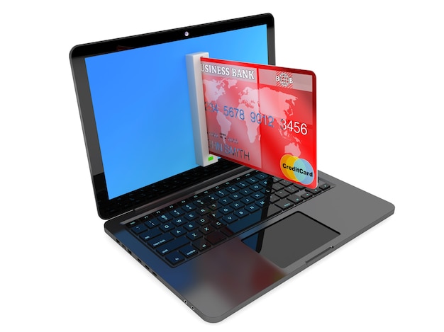 E-commerce Concept. Laptop computer and Credit Card on a white background