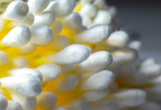 Ear cotton swabs on the white background