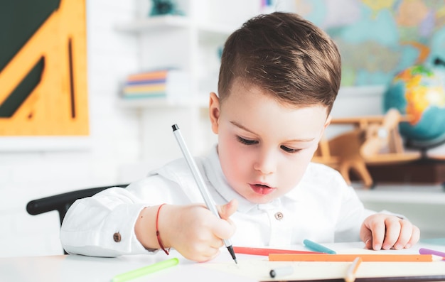 Early development Preschool boy with educational toys Child of primary school