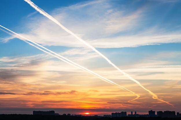 Early sunrise over city in summer