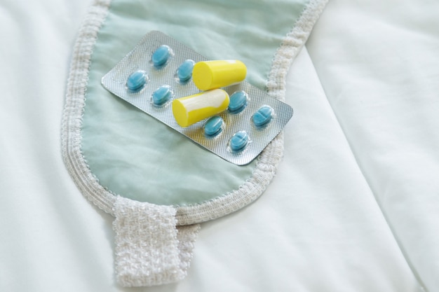 Earplugs, blindfold and sleeping pills