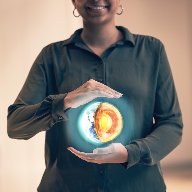 Earth anatomy graphic globe hologram and woman hands holding a 3d digital model Science software planet data and futuristic illustration to show geography and virtual display of sphere layers