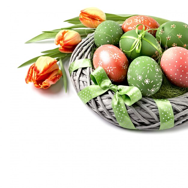 Easter backet with eggs and flowers