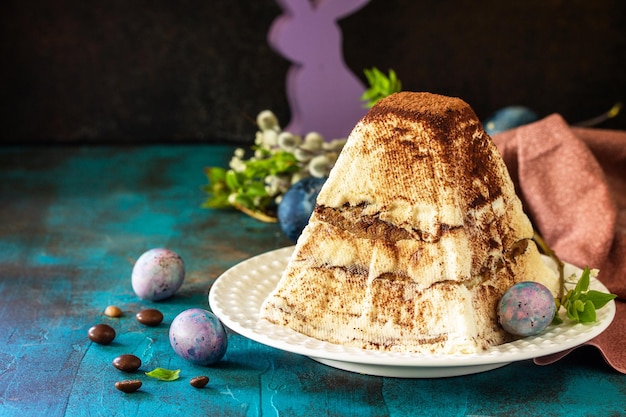 Easter background Dessert tiramisu Easter cottage cheese pascha on festive table Copy space