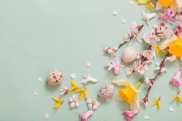 Easter background with eggs and flowers