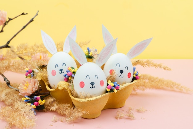 Easter background with eggs in the form of rabbits