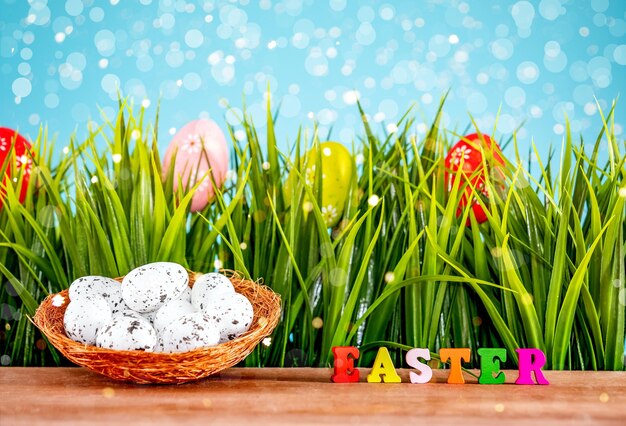 Easter background with eggs and green grass