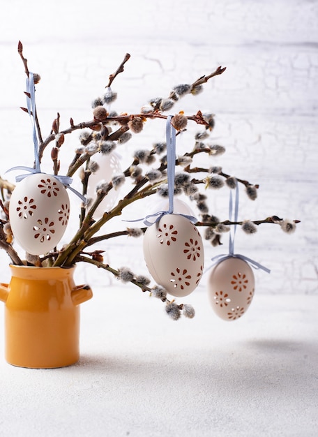 Easter background with willow and eggs