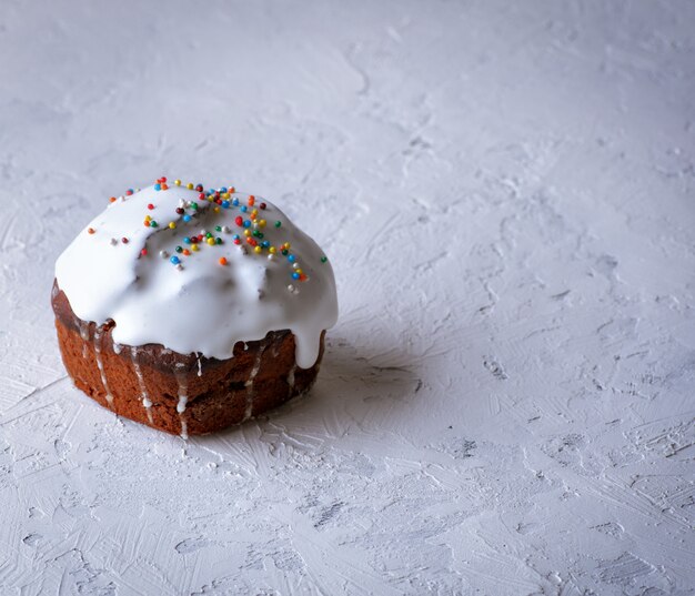 Easter baking with white sugar glaze and colorful decor balls