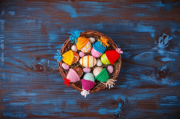 Easter basket filled with colorful eggs