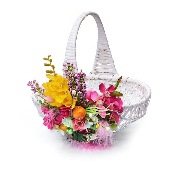 Easter basket from a flower arrangement on white background