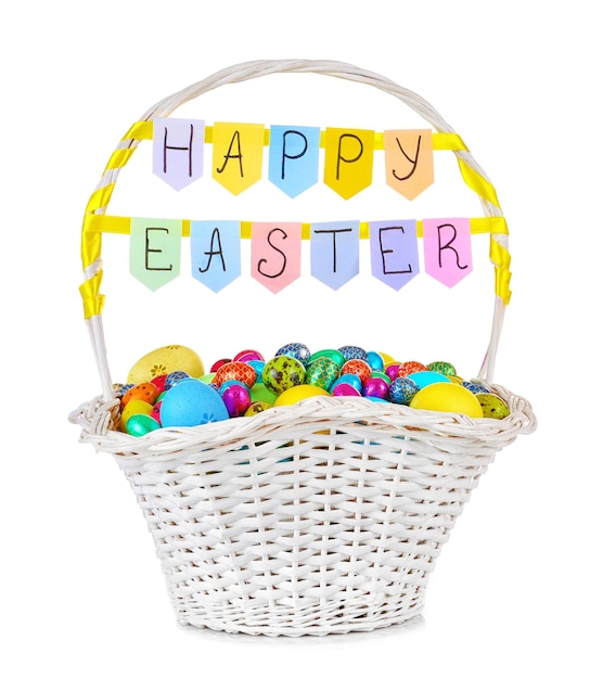 Easter basket with colorful eggs on white background