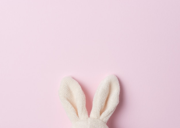 Easter bunny ears on pink.