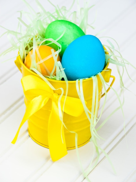 Easter busket with multi-color eggs.