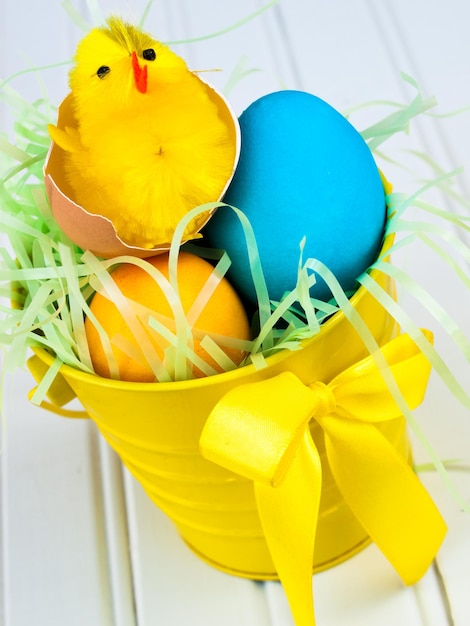 Easter busket with multi-color eggs.