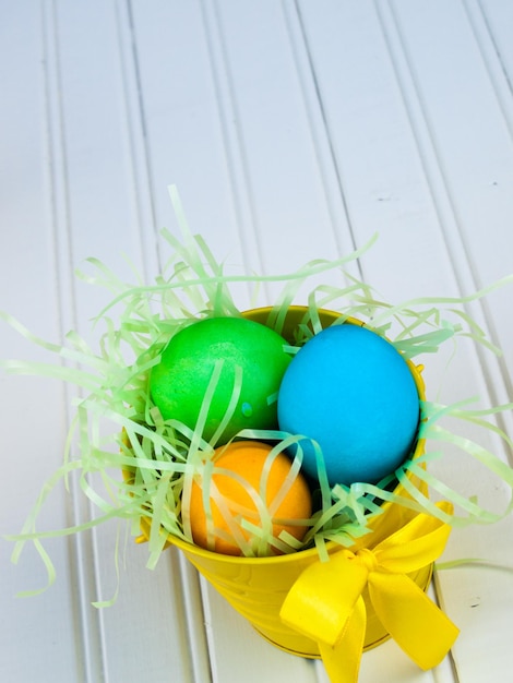 Easter busket with multi-color eggs.