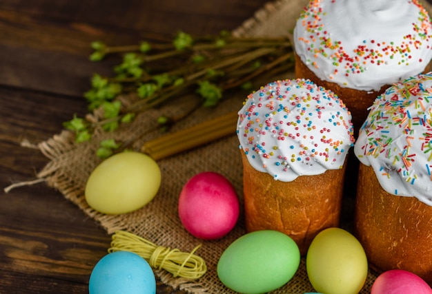 Easter cake on a brown wooden table. 