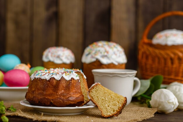 Easter cake on a brown wooden table. 