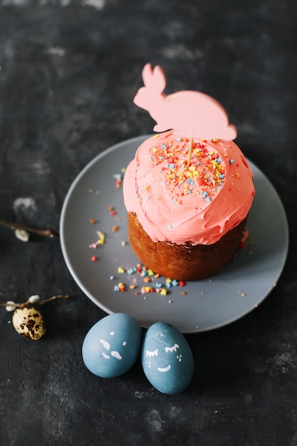 Easter cake colorful eggs and willow branches, happy easter holiday concept