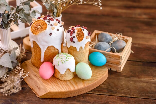 Easter cake and Easter eggs festive celebration table setting traditional decoration and treats