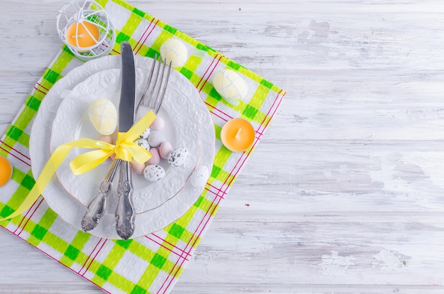 Easter cake and place setting for easter