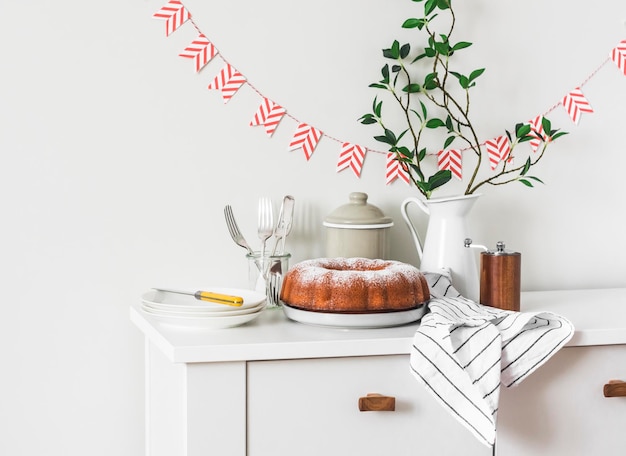 Easter cake served on a festive decor tea table in a bright room