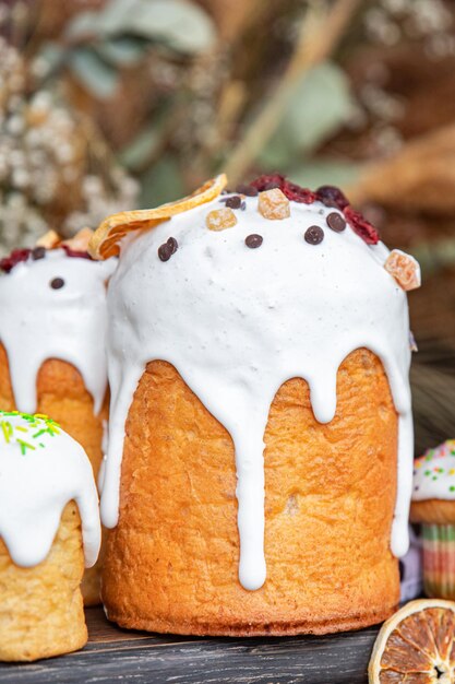 easter cake white icing and colored decorations sweet bread homemade baking dessert celebratory