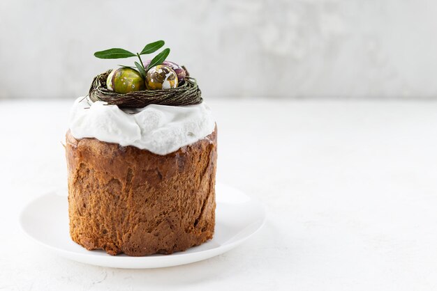 Easter cake with chocolate nest and eggs on the table Horizontal orientation copy space