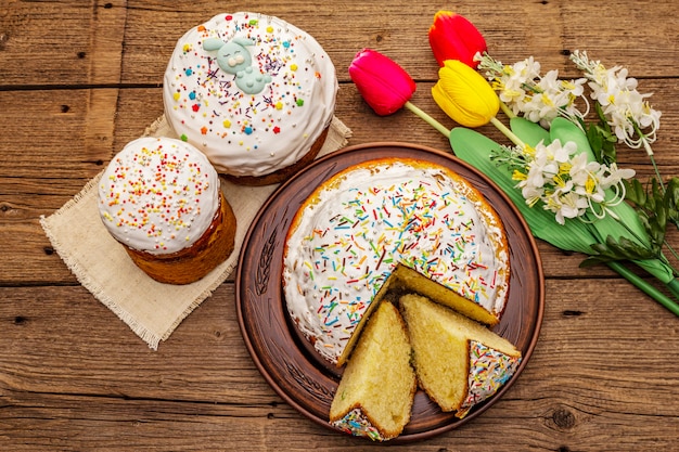 Easter cakes on old wooden table. Traditional Orthodox festive bread