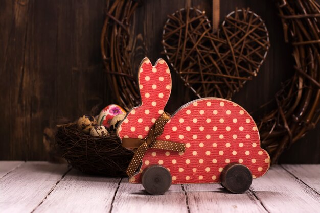 Easter card, wooden toy of a rabbit 