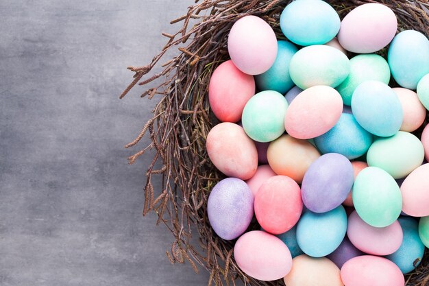 Easter colored eggs on the vintage background.