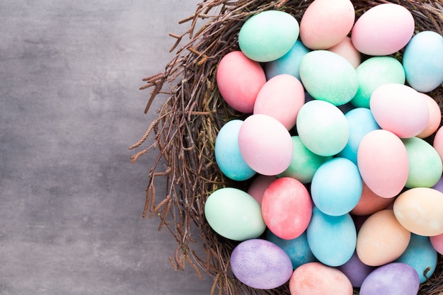 Easter colored eggs on the vintage nest.