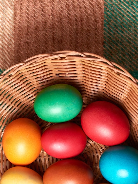 Photo easter colored eggs on the vintage surface.