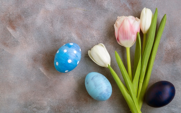 Easter colored eggs with tulips.