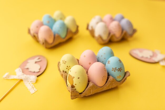 Easter colorful eggs on a yellow background Easter card