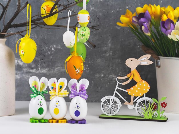 Easter composition with eggs bunnies flowers and other elements