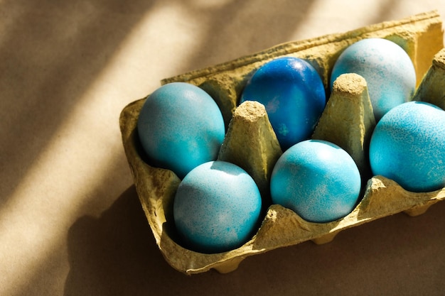 Easter concept Egg box with blue coloured Easter eggs