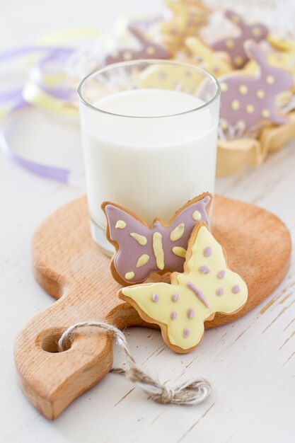 Easter cookies in egg holder, milk