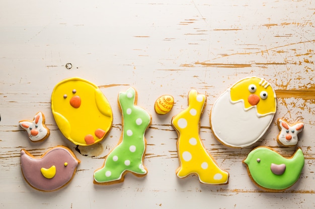 Easter cookies on white wood 