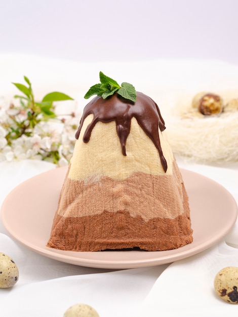 Easter cottage cheese with three types of chocolate, on a light background
