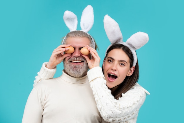 Easter couple happy smiling couple with easter eggs