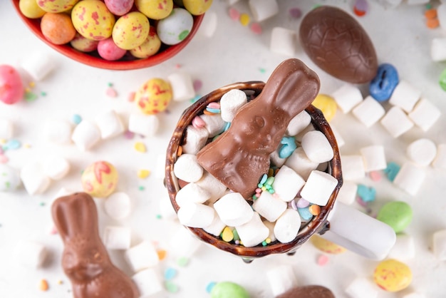 Easter cute hot chocolate mug with chocolate eggs and rabbit