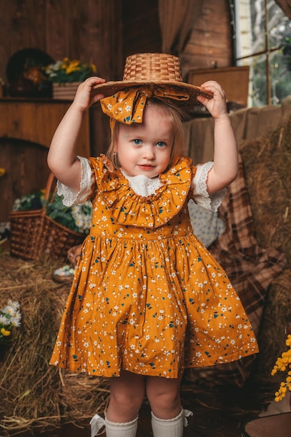 Easter day Family preparing for Easter Girl holding basket with painted eggs on a wooden backgroun