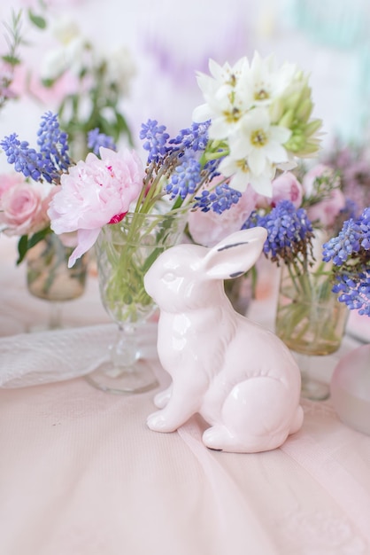 Easter decor, festive Easter table setting in pastel colors, spring holiday, wedding table