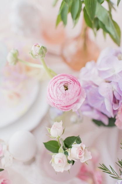 Easter decor, festive Easter table setting in pastel colors, spring holiday, wedding table